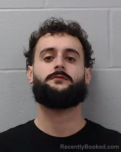 Booking photo from Hays County, Texas