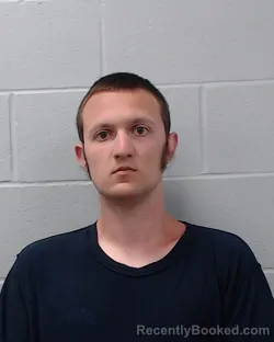 Mugshot of Caleb Travis Huddleston