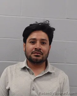 Mugshot of Juan Bustos-Carbajal