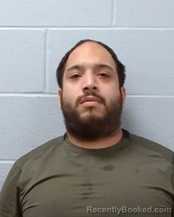 Mugshot of Eli Manrrique