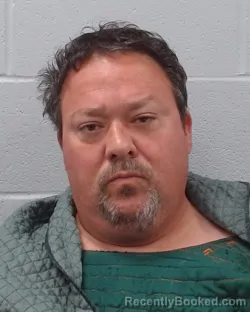 Mugshot of Charles Ray Cunningham booked in Hays County, Texas on April 4, 2026