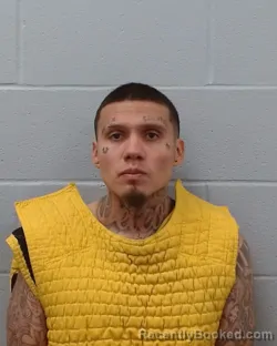 Mugshot of Gilbert Joshua De Leon booked in Hays County, Texas on April 4, 2026