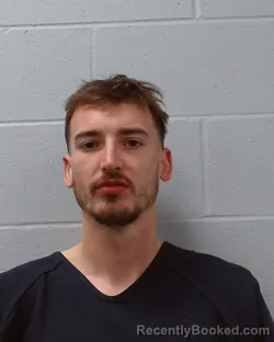 Mugshot of Christian Cameron Dewitt booked in Hays County, Texas on April 5, 2026