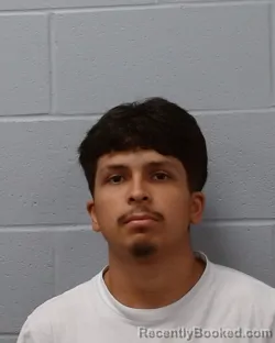 Mugshot of Matthew Alex Carrizales booked in Hays County, Texas on April 15, 2026