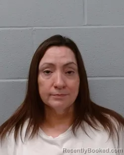 Mugshot of Cynthia Ann Martinez booked in Hays County, Texas on April 15, 2026