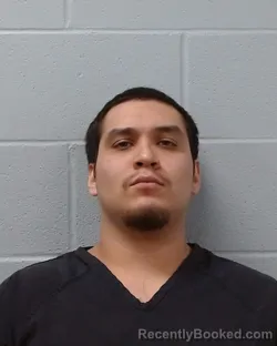 Mugshot of Alezander Cruz booked in Hays County, Texas on April 15, 2026