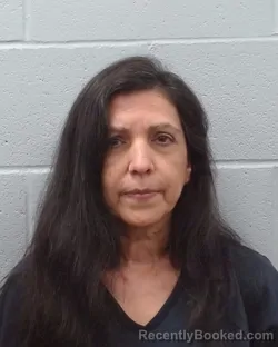 Mugshot of Myrna Araceli Avina booked in Hays County, Texas on April 17, 2026