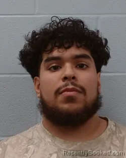 Mugshot of Alonzo Enrique Chapa booked in Hays County, Texas on April 17, 2026