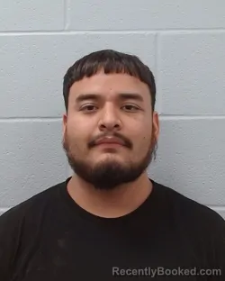 Mugshot of Nicolas Chaparro Patino booked in Hays County, Texas on April 18, 2026