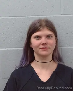 Mugshot of Georgia Caroline Moore booked in Hays County, Texas on April 22, 2026