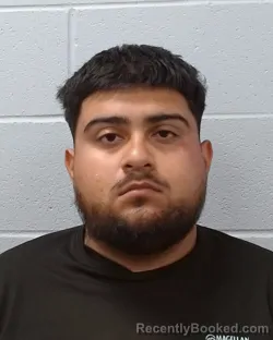 Mugshot of Sergio Orlando Contreras booked in Hays County, Texas on April 23, 2026