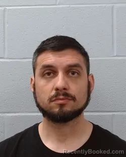 Mugshot of Mario Alfonso Gonzalez booked in Hays County, Texas on April 25, 2026