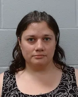 Mugshot of Miriam Carolina Urbina booked in Hays County, Texas on April 26, 2026