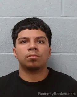 Mugshot of Mark Anthony Nehimiah Briones booked in Hays County, Texas on April 26, 2026