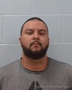 Mugshot of Andrew Edward Beltran booked in Hays County, Texas on April 27, 2026