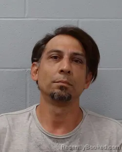 Mugshot of Bezhan Nicholas Bahrami booked in Hays County, Texas on April 30, 2026