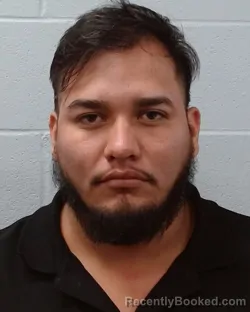 Mugshot of Alexis Isreal Diaz Flores booked in Hays County, Texas on May 2, 2026