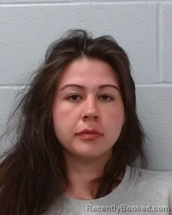 Mugshot of Sarah Isabella Schild booked in Hays County, Texas on May 2, 2026