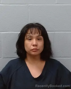 Mugshot of Ashley Nicole Pedraza booked in Hays County, Texas on May 5, 2026