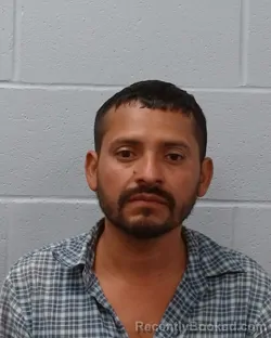 Mugshot of Homero Cruz Sanchez booked in Hays County, Texas on May 8, 2026
