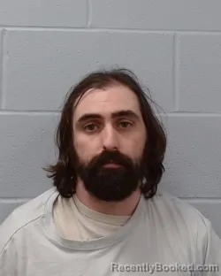 Mugshot of Chad Aaron Mahan booked in Hays County, Texas on May 8, 2026