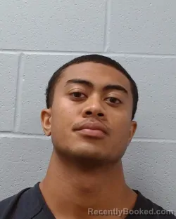 Mugshot of Justin Tien Clark booked in Hays County, Texas on May 9, 2026