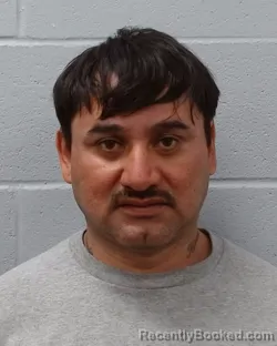 Mugshot of Eduardo Arreola Herrera booked in Hays County, Texas on May 9, 2026