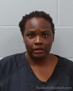 Mugshot of Esther Nyanduko Nyaberi booked in Hays County, Texas on May 11, 2026