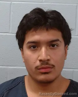 Mugshot of Abram Dominick Espinoza booked in Hays County, Texas on May 14, 2026