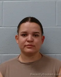 Mugshot of Dominique Vinetta Faulkner booked in Hays County, Texas on June 16, 2026