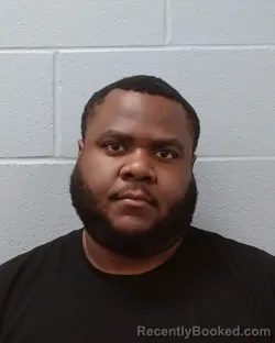 Mugshot of Tyvione Ahmad Roaches booked in Hays County, Texas on June 17, 2026