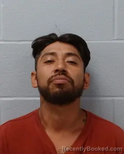 Mugshot of Eduardo Ulises Juarez-Pacheco booked in Hays County, Texas on June 23, 2026