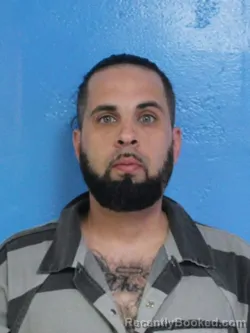 Mugshot of DUSTIN ALLEN HUBMANN