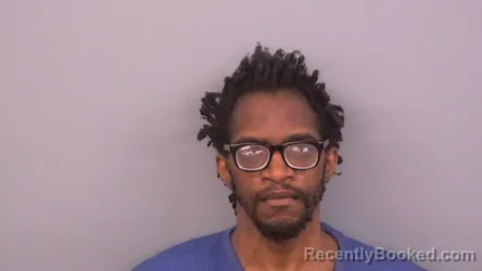 Mugshot of JUSTIN EDWARD TAYLOR