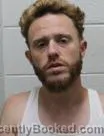 Mugshot of Justin Wayne Briggs booked in Washington County, Tennessee on August 24, 2026