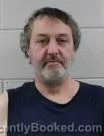 Mugshot of Charles Eric Pitman booked in Washington County, Tennessee on August 7, 2026