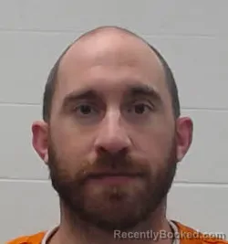 Mugshot of Joshua Dale Stinnett booked in Wayne County, Tennessee on August 18, 2026