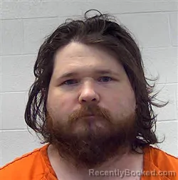 Mugshot of Christopher Allen Hughes booked in Wayne County, Tennessee on August 27, 2026