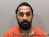 Mugshot of MENA M AWAD booked in Wilson County, Tennessee on June 22, 2026