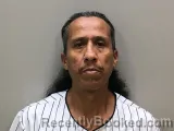 Mugshot of Santos Jr Aguirre booked in Wilson County, Tennessee on September 23, 2026