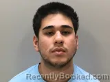 Mugshot of Khumoyunkhon Ikromjonov booked in Wilson County, Tennessee on August 12, 2026