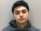 Mugshot of MALIK J RATTANAVONG