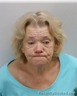 Mugshot of MELANIE KATHLEEN OKUM