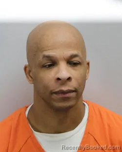 Mugshot of MWANDO MICHAEL AMERSON