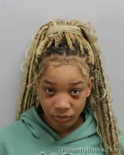 Mugshot of ALEXIS EMANI BUTTS booked in Virginia Beach County, Virginia on March 9, 2026