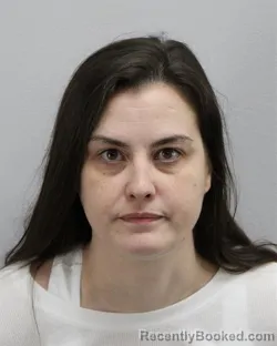 Mugshot of NICOLE KATHLEEN VARNEY booked in Virginia Beach County, Virginia on March 20, 2026