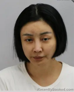 Mugshot of JUE WANG booked in Virginia Beach County, Virginia on March 12, 2026