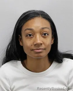 Mugshot of MAHOGANY DEZIREE GREER booked in Virginia Beach County, Virginia on March 20, 2026