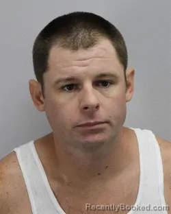 Mugshot of MICHAEL CARLO MICHEL booked in Virginia Beach County, Virginia on May 21, 2026