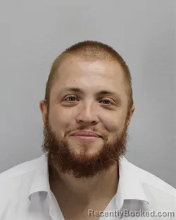 Mugshot of Christian Adam Lane booked in Virginia Beach County, Virginia on August 11, 2026